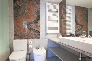 Koupelna v ubytování Stay U-nique Apartments Salvador Espriu