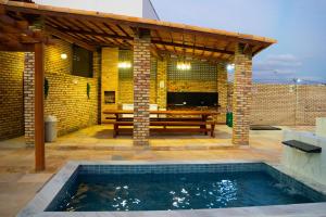 Bazén v ubytování Club Santa Cruz nebo v jeho okolí