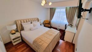 Postel nebo postele na pokoji v ubytování Hotel-Apartment INKASABIOS