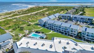 an aerial view of a resort with a pool at New listing - Condo on Harbor Island in St. Helena Island