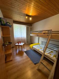 Voodi või voodid majutusasutuse Winterzsuber Lenzerheide toas
