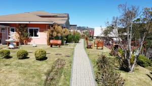 Κήπος έξω από το Pousada Caminhos da Vila Chantal