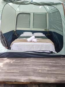 Postel nebo postele na pokoji v ubytování Camping à la ferme