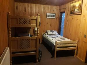 Voodi või voodid majutusasutuse Hotel casa kaiser toas