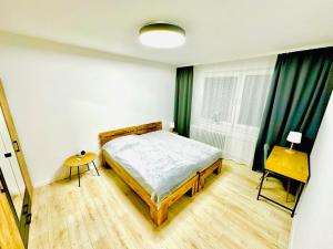 Postel nebo postele na pokoji v ubytování KaBENY