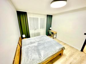 Postel nebo postele na pokoji v ubytování KaBENY