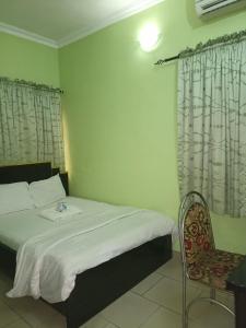 A bed or beds in a room at Haute Aparthotel