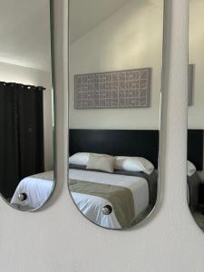Ein Bett oder Betten in einem Zimmer der Unterkunft DUNAMIS HOTEL