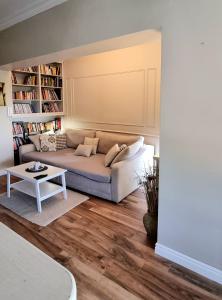 a living room with a couch and a table at Beach apartment Suzy&Demi in Split