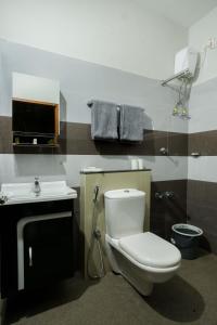 Koupelna v ubytování Swapna Home Suites
