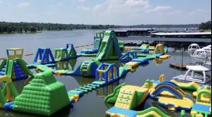 a bunch of inflatable slides in a water park at Lakefront Cabin - Texoma Coast - 14 in Mead
