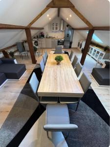 a large dining room with a table and chairs at MA - Maison 10 min PARIS EXPOS - 8 chambres in Malakoff