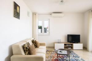 TV a/nebo společenská místnost v ubytování Apartment Eli