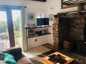 Kuchyň nebo kuchyňský kout v ubytování Countryside cottage near Crediton