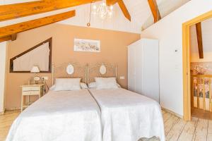 Postel nebo postele na pokoji v ubytování Casa El Pajar I y II