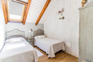 Postel nebo postele na pokoji v ubytování Casa El Pajar I y II