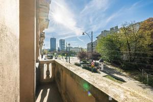 a view of a city street from a building at Polonia Residence Glamour by LookAp in Łódź
