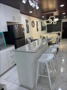 Kuchyň nebo kuchyňský kout v ubytování Las Palmeras