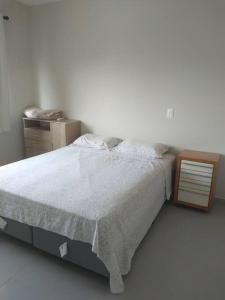 Una cama o camas en una habitación de Apart 1 dorm 1 banh na praia de Palmas Gov Celso R