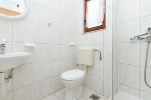 Kúpeľňa v ubytovaní Apartments Neva