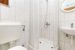 Kúpeľňa v ubytovaní Apartments Neva