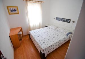 Postel nebo postele na pokoji v ubytování Apartment Vera