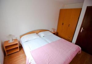 Postel nebo postele na pokoji v ubytování Apartment Vera