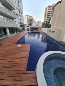 Bazen u ili blizu objekta Monoambiente amplio y cómodo Oasis