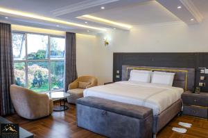 Krevet ili kreveti u jedinici u okviru objekta Highlands View Boutique Villas & Resort, Nyeri