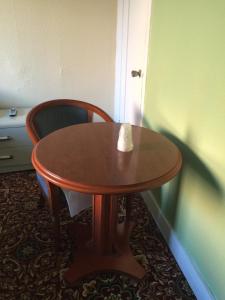 a small table and a chair in a room at Roxy Hotel in Los Angeles