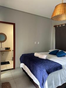 Casa Aconchego Lençóis客房内的一张或多张床位