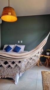 Casa Aconchego Lençóis客房内的一张或多张床位