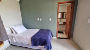 Casa Aconchego Lençóis客房内的一张或多张床位