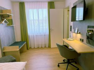 TV a/nebo společenská místnost v ubytování Hotel Restaurant Thum