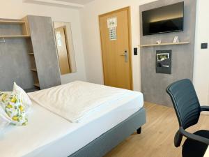 TV a/nebo společenská místnost v ubytování Hotel Restaurant Thum