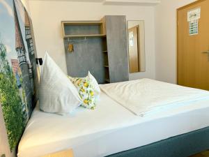 Postel nebo postele na pokoji v ubytování Hotel Restaurant Thum