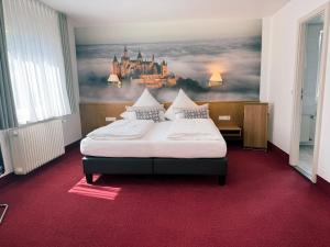 Postel nebo postele na pokoji v ubytování Hotel Restaurant Thum