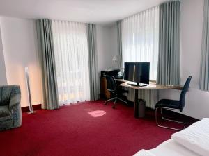 TV a/nebo společenská místnost v ubytování Hotel Restaurant Thum