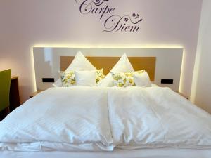 Postel nebo postele na pokoji v ubytování Hotel Restaurant Thum