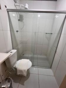a bathroom with a shower and a toilet at Martuno house in Fernando de Noronha