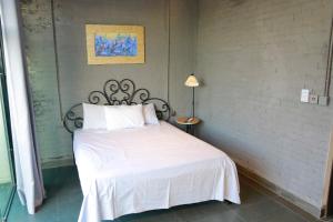 Postel nebo postele na pokoji v ubytování Lavender Hotel 202 - Nam Đuống, Thượng Thanh, Long Biên