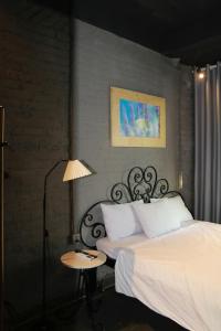 Postel nebo postele na pokoji v ubytování Lavender Hotel 202 - Nam Đuống, Thượng Thanh, Long Biên