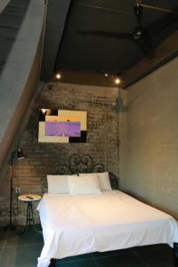 Postel nebo postele na pokoji v ubytování Lavender Hotel 202 - Nam Đuống, Thượng Thanh, Long Biên