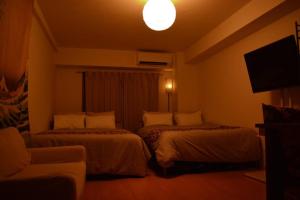 Hotel JTK 新今宮駅徒歩2分 大阪の観光地へアクセス抜群にあるテレビまたはエンターテインメントセンター