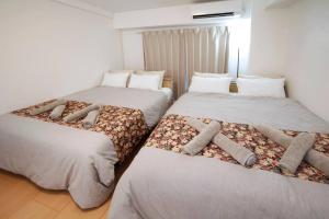 Hotel JTK 新今宮駅徒歩2分 大阪の観光地へアクセス抜群にあるベッド