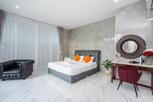 Postel nebo postele na pokoji v ubytování Love Here Poolvilla หัวหิน
