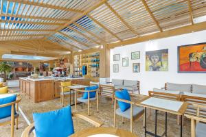 Restoran või mõni muu söögikoht majutusasutuses Wafaifo Resort Hoi An