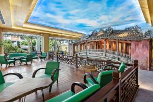 Restoran või mõni muu söögikoht majutusasutuses Wafaifo Resort Hoi An