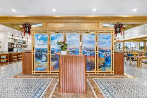 Restoran või mõni muu söögikoht majutusasutuses Wafaifo Resort Hoi An