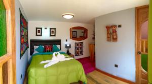 Postel nebo postele na pokoji v ubytování Hotel Inka King